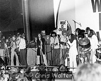 Photo of John Lennon 1969 with George Harrison, Eric Clapton, Delaney Bramlett, Nonnie Bramlett, Yoko Ono and John Lennon at the Lyceum, December 15th 1969.