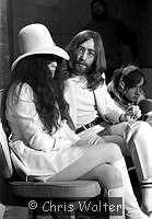 Photo of John Lennon and Yoko Ono 1969 at London Heathrow Airport.