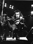 Photo of Kiss 1976 Gene Simmons<br>© Chris Walter<br>